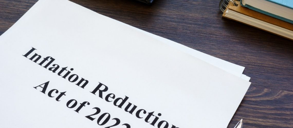 papers-with-inflation-reduction-act-of-2022-and-notepad-picture-id1417229705